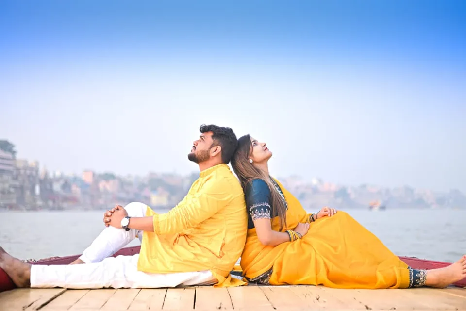 A pre-wedding portrait in Banarasi silk against heritage walls, photographed by One Moon Studio in Varanasi.